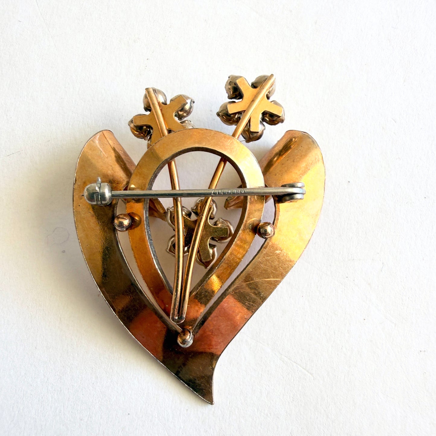 Vintage Krementz gold overlay heart brooch with rhinestone flowers
the back