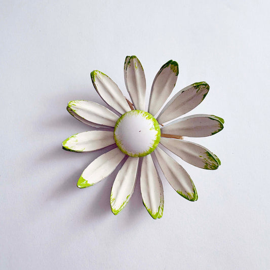 Vintage white enamel daisy brooch with green tipped petals, 1960s