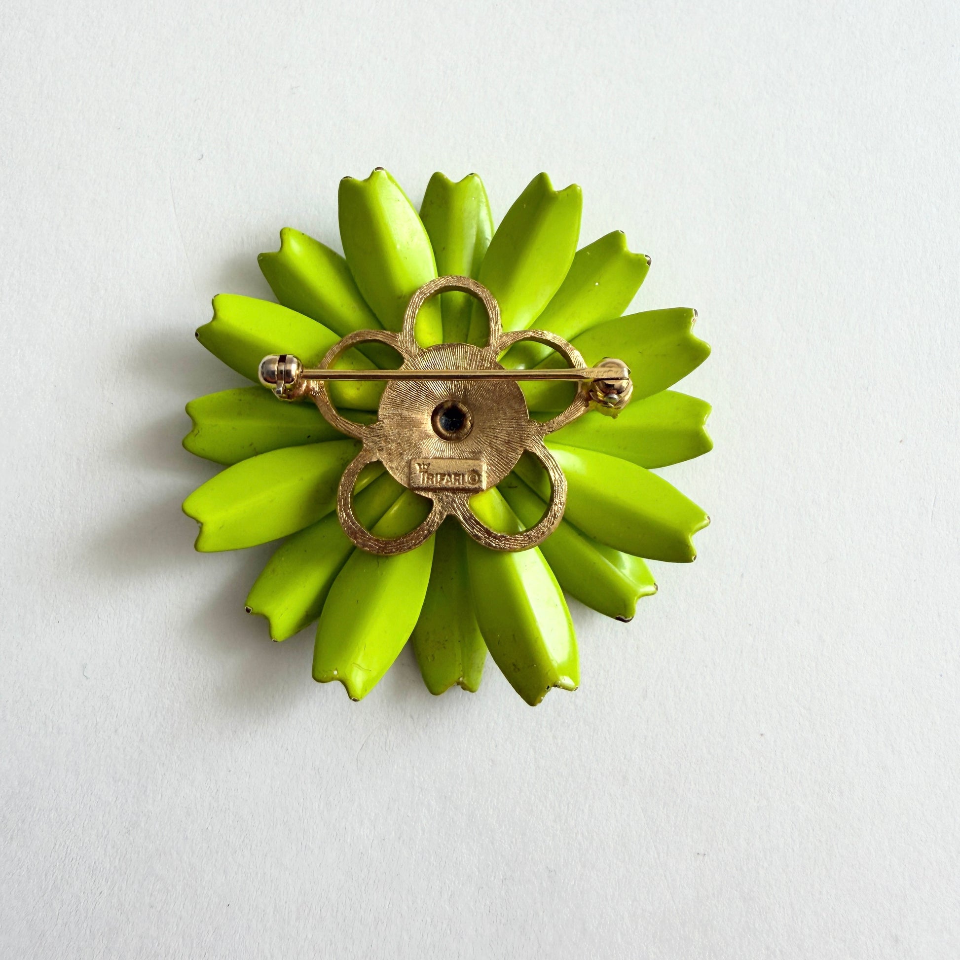 Vintage Crown Trifari green enamel flower brooch back side, 1960s