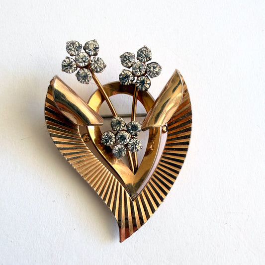 Vintage Krementz gold overlay heart brooch with rhinestone flowers
