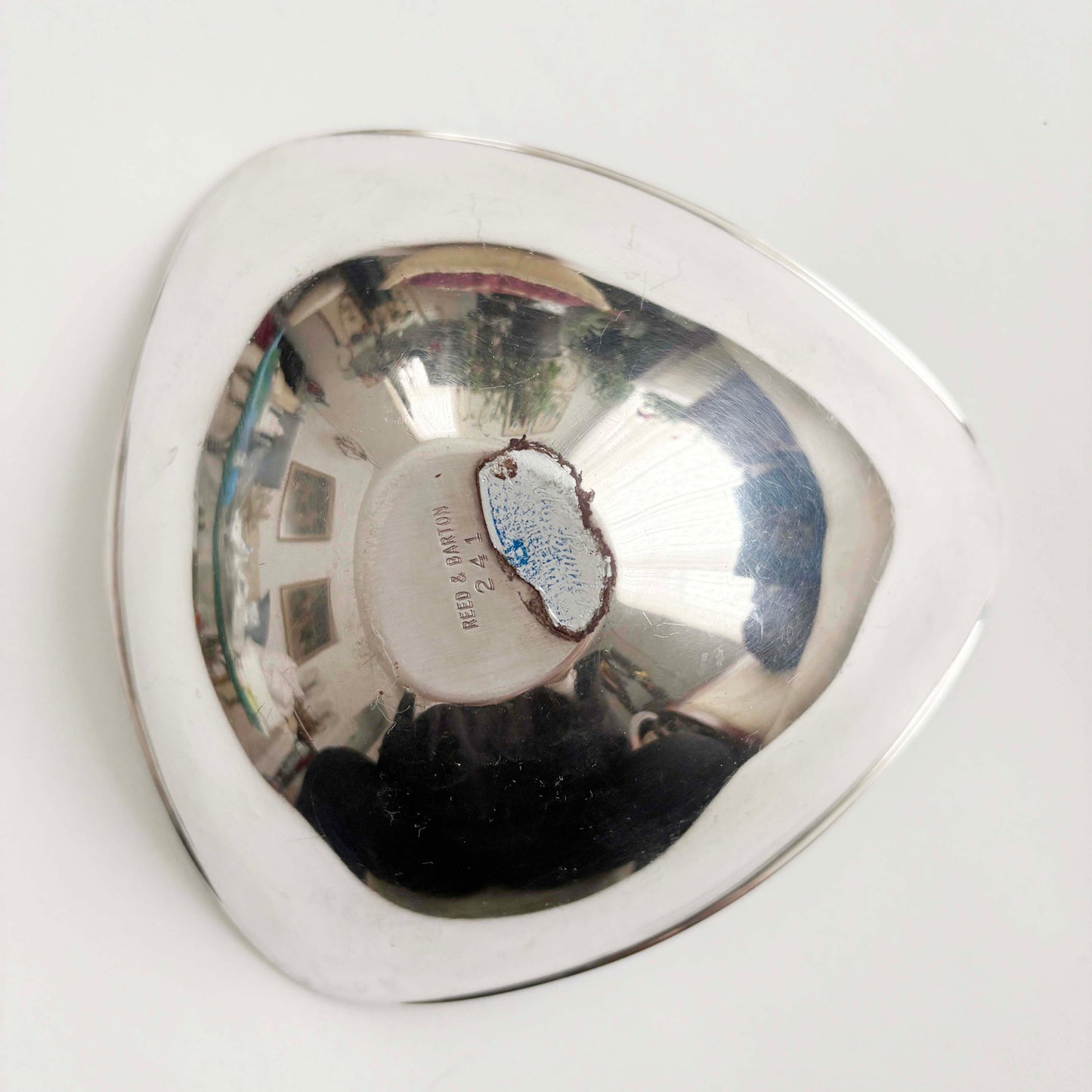 Heart-shaped silver dish  on a white background