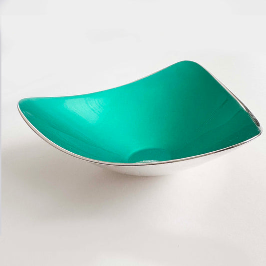 Turquoise silver bowl on a white background