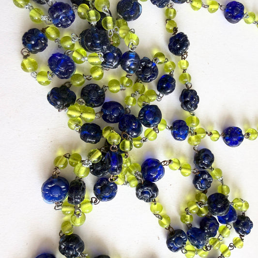 Vintage Czech glass necklace with blue floral beads and uranium green glass glowing under UV light, 53 inch strand