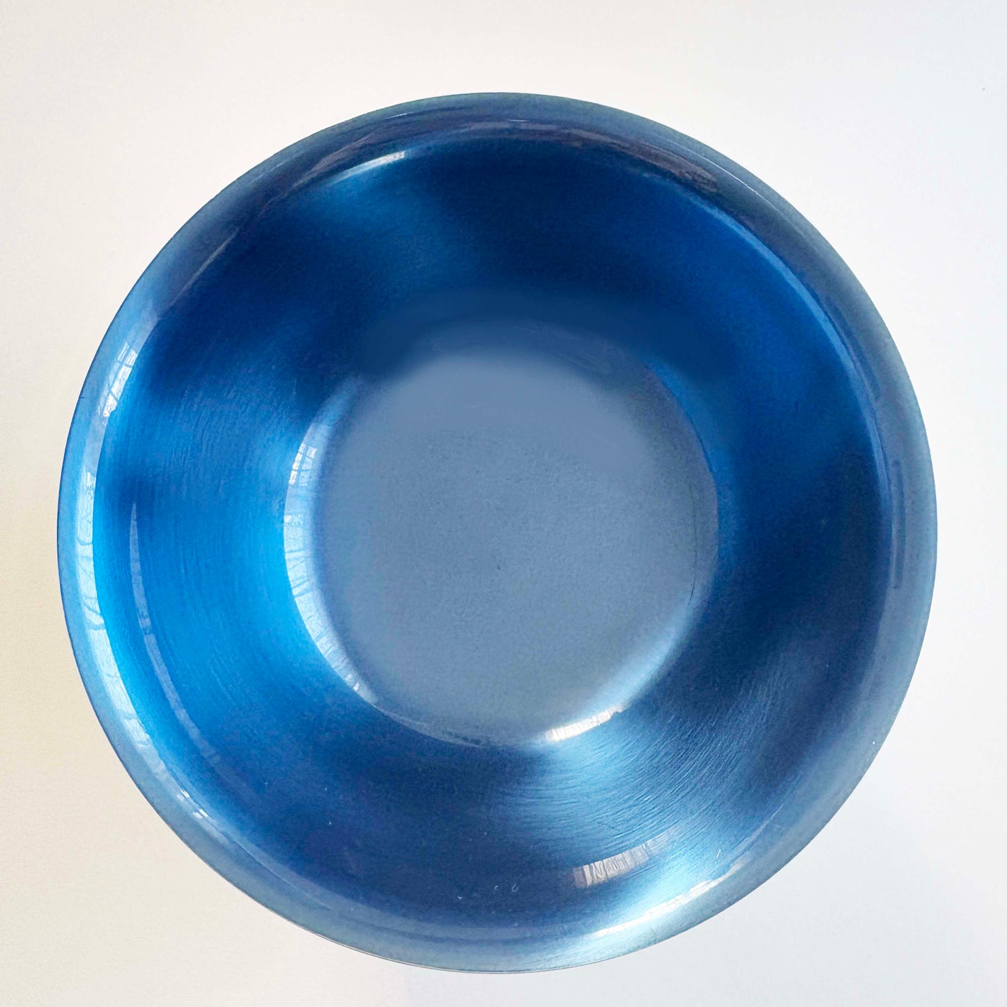 Blue silver bowl on a white background