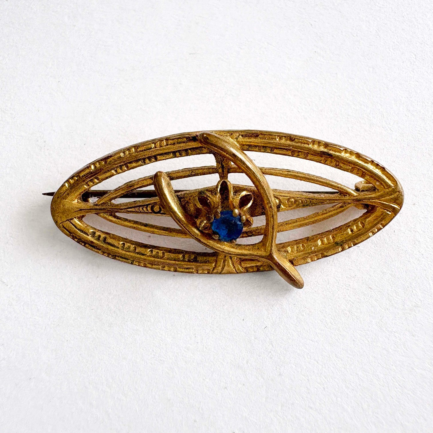 Antique Edwardian Wishbone Brooch Gold Tone with Sapphire Blue Stone c.1900–1920