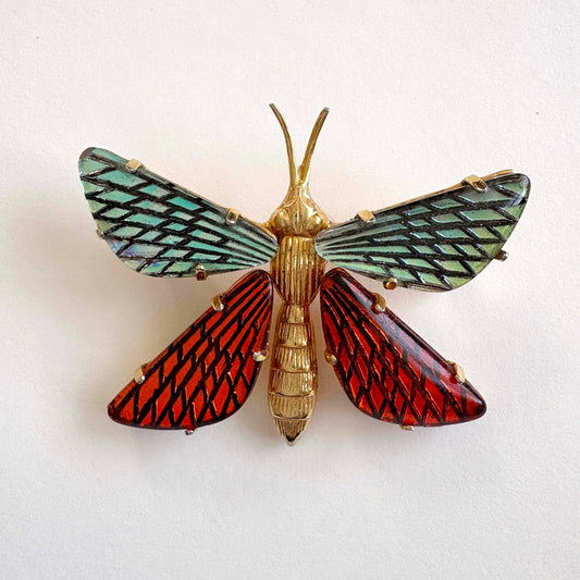 Vintage Austrian butterfly brooch with turquoise and amber poured glass wings in gold tone metal, marked Made in Austria