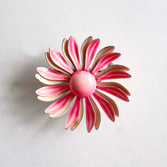 Vintage two-tone pink enamel flower brooch with saturated pink center over pale pink background, 1960s–70s mod pop-art pin.