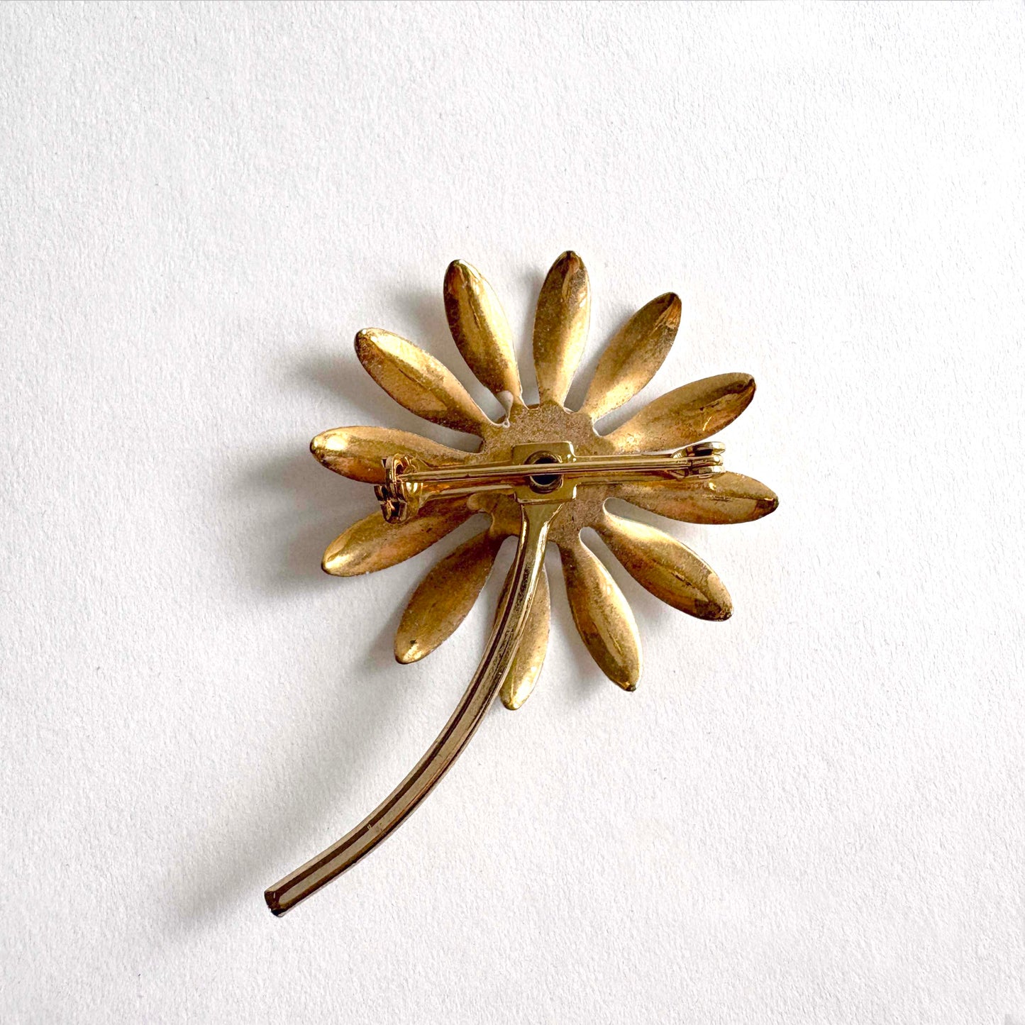 Vintage White Enamel Daisy Brooch with Black Center and Green Stem | 1960s