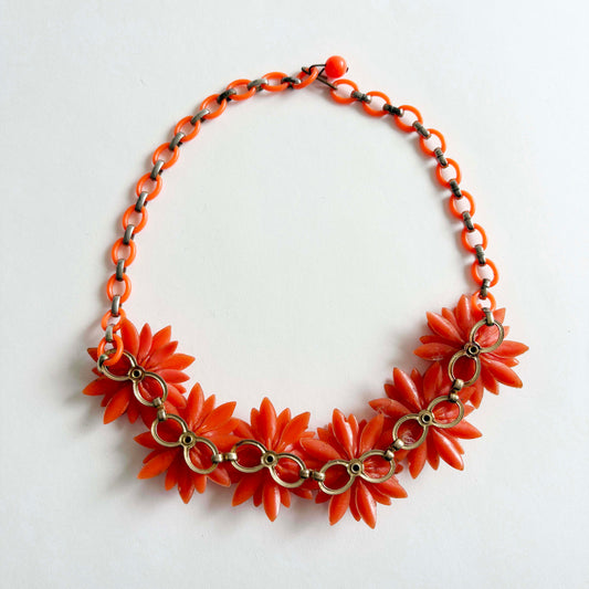 Vintage Coro orange soft plastic flower necklace with AB rhinestones, 1960s, the back side shown