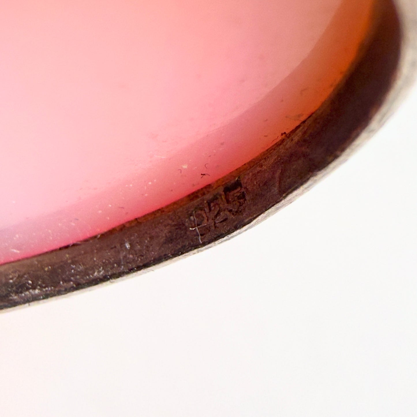 Macro view of the interior bezel, highlighting the authentic .925 sterling silver hallmark characteristic of studio-crafted work.